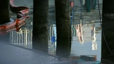 Under Dock Reflections Stock Footage 22396655