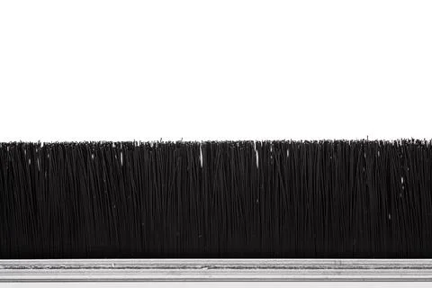 Under door insulation brush seal close up shot against white background.. Stock Photos