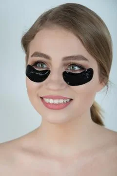 Under Eye Skin Black Patch. Closeup Of Beautiful Young Woman Face With Moistu Stock Photos