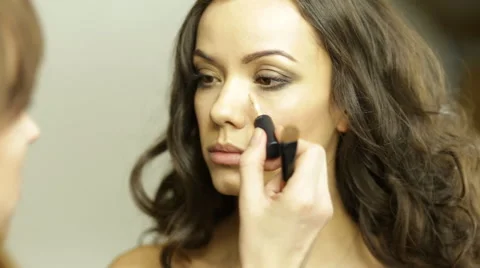 Under eyes tone smoothing Stock Footage 63043613