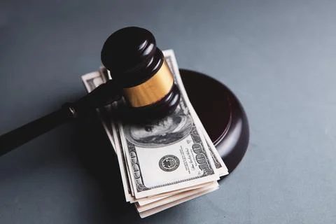 Under the hammer of the judge banknotes Stock Photos