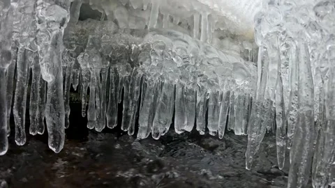 Under the Ice- Slow Motion Icicles Beneath Winter River Ice at Ken Lockwood  Stock Footage 341125589