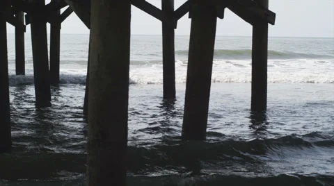 Under pier at the beach Stock Footage 42011227