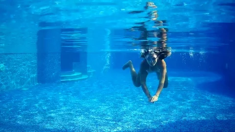 Under poll swimming Stock Footage 80367321