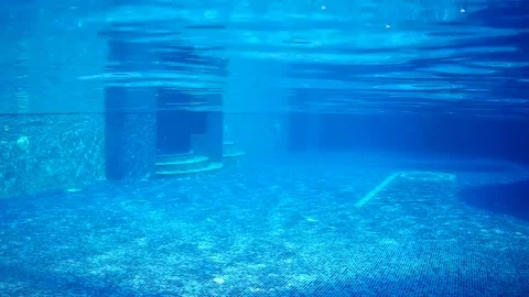 Under poll swimming girl Stock Footage 80367372