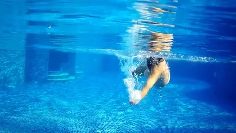 Under pool swimming Stock Footage 80367265