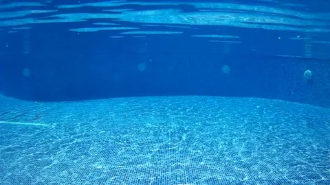 Under pool swimming Stock Footage 80367385