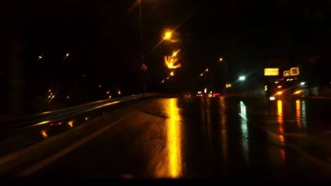 Under rain night drive car windshield in traffic Stock Footage 164241137