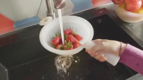 Under the Stream: Strawberries Get a Rinse Stock Footage 270770965
