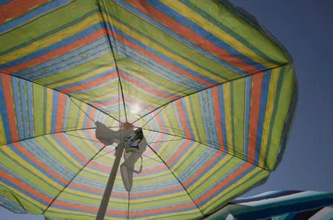 Under a Sun Umbrella Stock Photos