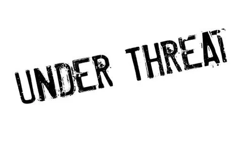 Under Threat rubber stamp Stock Illustration