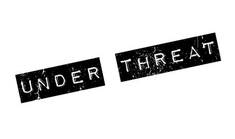 Under Threat rubber stamp Illustrazione stock