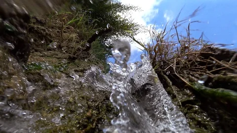 Under a tiny waterfall Stock Footage 119359468