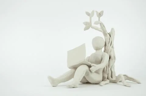 Under the tree freelance work Stock Photos