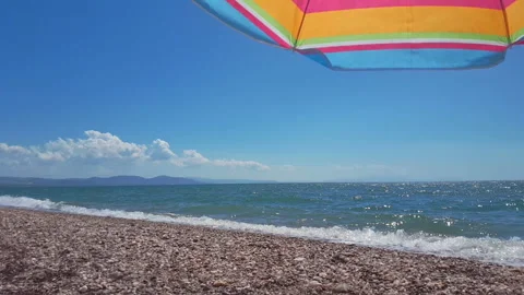 Under Umbrella Beach Stock Footage 245296778