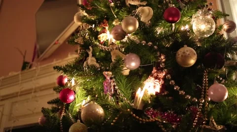 Under view of Christmas tree with balls, fireplace and tv Stock-Footage 63029353