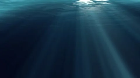 Under Water, Deep Sea with Lightbeams and Waves Stock Footage