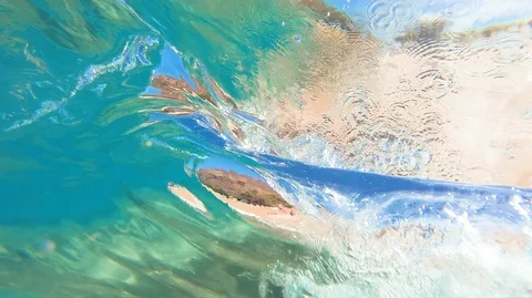 Under Water Slow Motion View Of Wave Breaking At A Beach Stock Footage 120671557