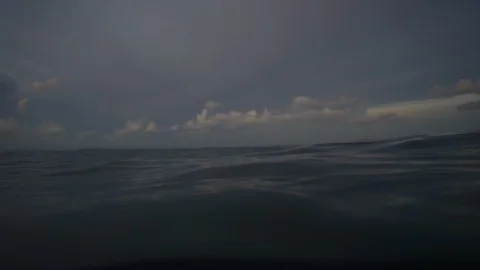 Under Water surface view of ocean and skyline Stock Footage 111840514