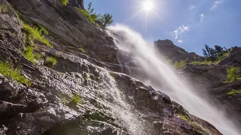 Under waterfall with blue sky Stock Footage 40099214