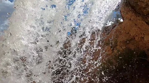 Under the waterfall Video stock 205763253