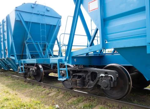 Undercarriage of a train carriage, wheels of a freight train close-up. Stock Photos