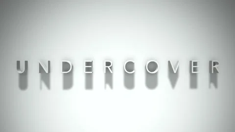 Undercover 3D title animation with shadows on a white background Stock Footage 297467153