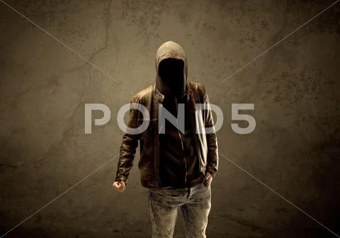 Undercover hooded stranger in the dark Stock Photos