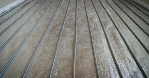 Underfloor heating pipes for water heating. Heating systems. Video stock 131346906