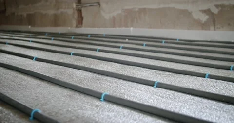 Underfloor heating pipes for water heating. Heating systems. Slide camera Stock Footage 131472595