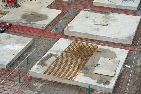 Underfloor Heating System Installation with Plastic Pipes at Construction Sit Stock Photos