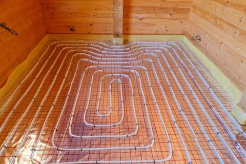 Underfloor surface heating pipes. Low temperature heating concept Stock Photos