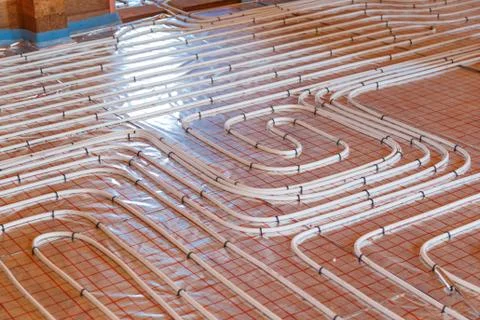 Underfloor surface heating pipes. Low temperature heating concept Stock Photos