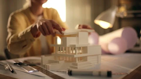 Undergraduate architecture student work on models of the modern house. Focusing Stock Footage 270538496