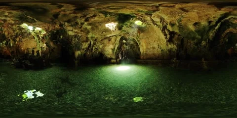 Underground cave with clear green water and rock formations. Camotes Vídeo Stock 343332340