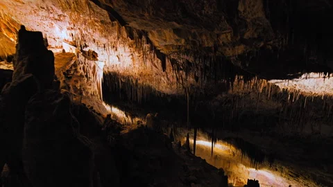 An underground cave formed of carbonate limestone rocks in Majorca, Spain. Stock Footage 249337119