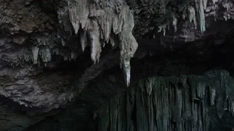 Underground Cave with Stalactite Rock Formations Hanging from Kuza Cave Ceiling Stock Footage 152346538