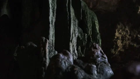 Underground Cave with Stalactite Rock Formations Hanging from Kuza Cave Ceiling Stock Footage 153192948