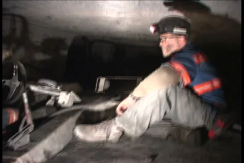 Underground Coal Miners Ride to work Stock Footage 4885404
