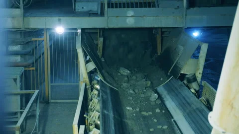 Underground conveyor with ore moving along Stock Footage 158354860
