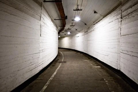 Underground corridor with bright lighting Stock-Fotos