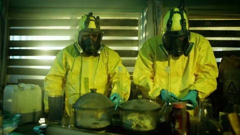 In the Underground Drug Laboratory Two Clandestine Chemists Make Drugs. Stock Footage 80246087