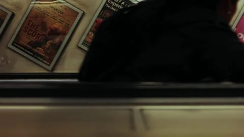 Underground escalator posters Stock Footage 318552415