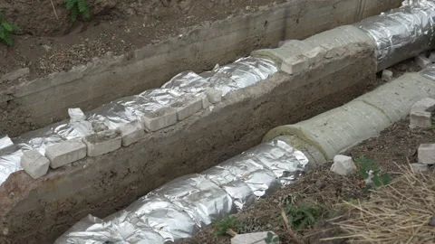 Underground heat pipes. Close-up. Side view. Stock Footage 287416342