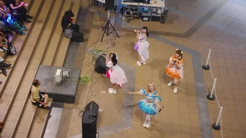Underground Idols dance for small group of dedicated Fans, overhead shot Stock Footage 341488297