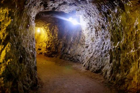 Underground mine passage with light Stock Photos