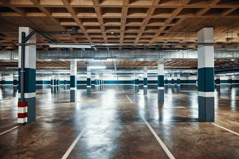 Underground parking. Empty garage Stock Photos