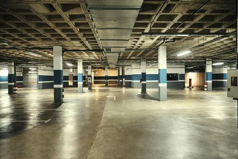 Underground parking. Empty garage Stock Photos
