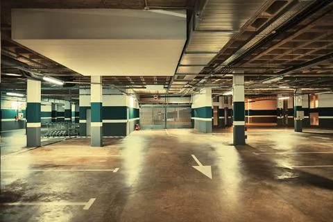 Underground parking. Empty garage Stock Photos
