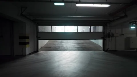 Underground Parking Exit with Automatic Gate and Light Contrast Video stock 312627109